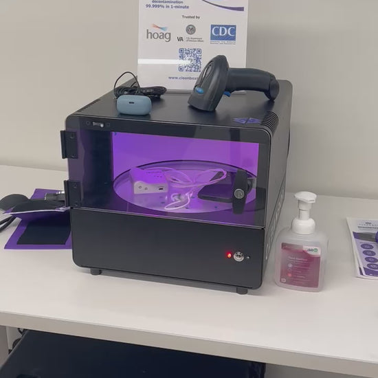 Cleanbox OmniClean video showing a medical device and a phone being decontaminated using UVC LED light in 1-minute